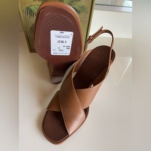Size 9, Tory Burch Royal Tan wedges, never worn…purchased 199.00. sale $50.00